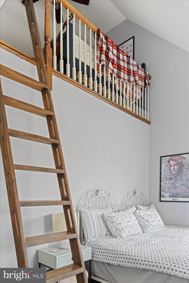 bedroom with vaulted ceiling