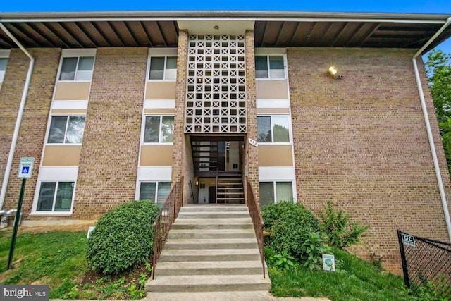 view of building exterior with stairway