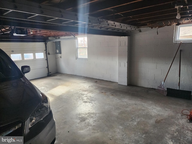 parking deck with electric panel and a garage door opener