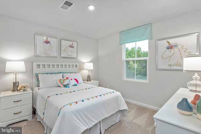 bedroom featuring light carpet, baseboards, and visible vents