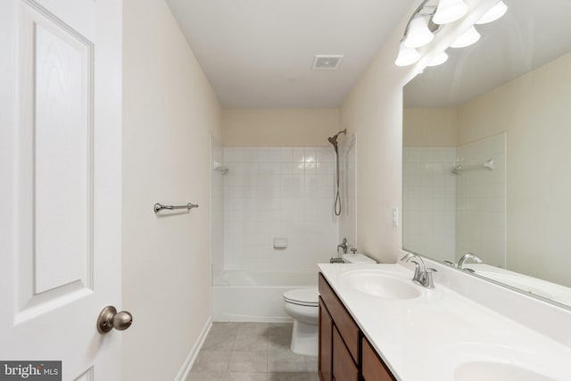 full bath with double vanity, visible vents, toilet, a sink, and tile patterned flooring