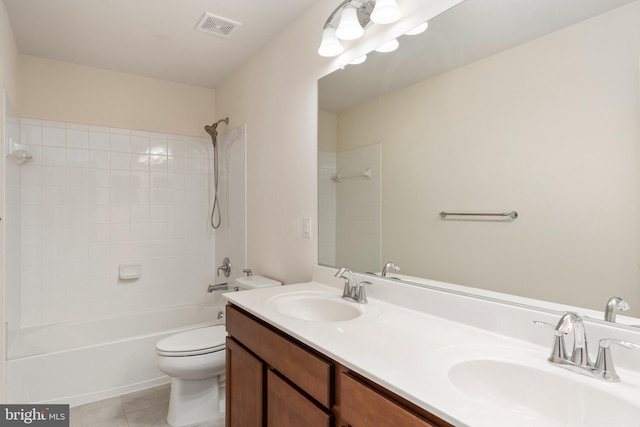 full bath with visible vents, a sink, toilet, and tile patterned floors