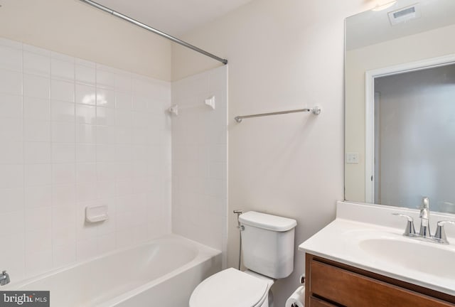 full bath with visible vents, vanity, toilet, and bathing tub / shower combination