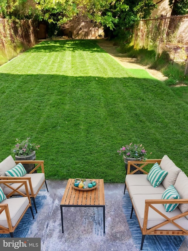 view of yard with a patio and fence