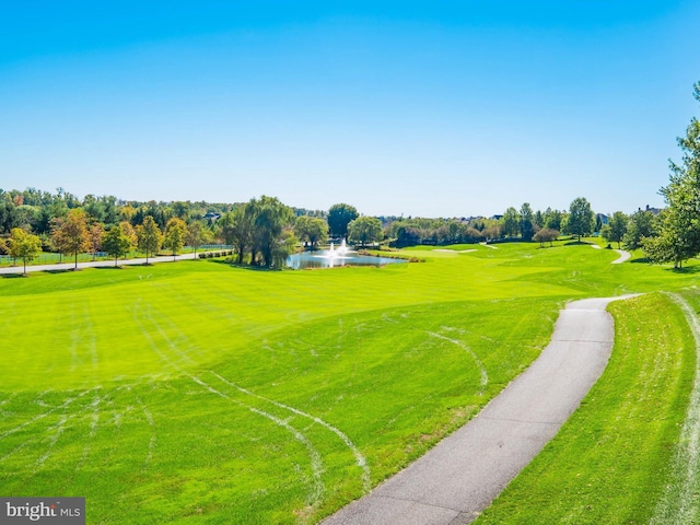 surrounding community with a water view