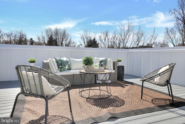 view of patio / terrace with outdoor lounge area and a wooden deck