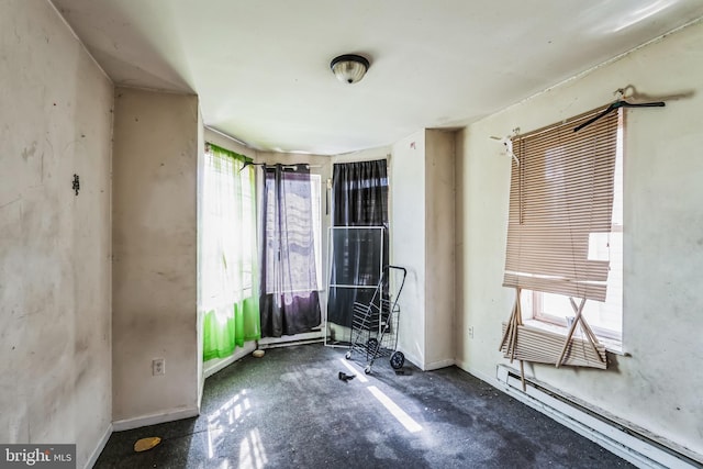 interior space with plenty of natural light and baseboards