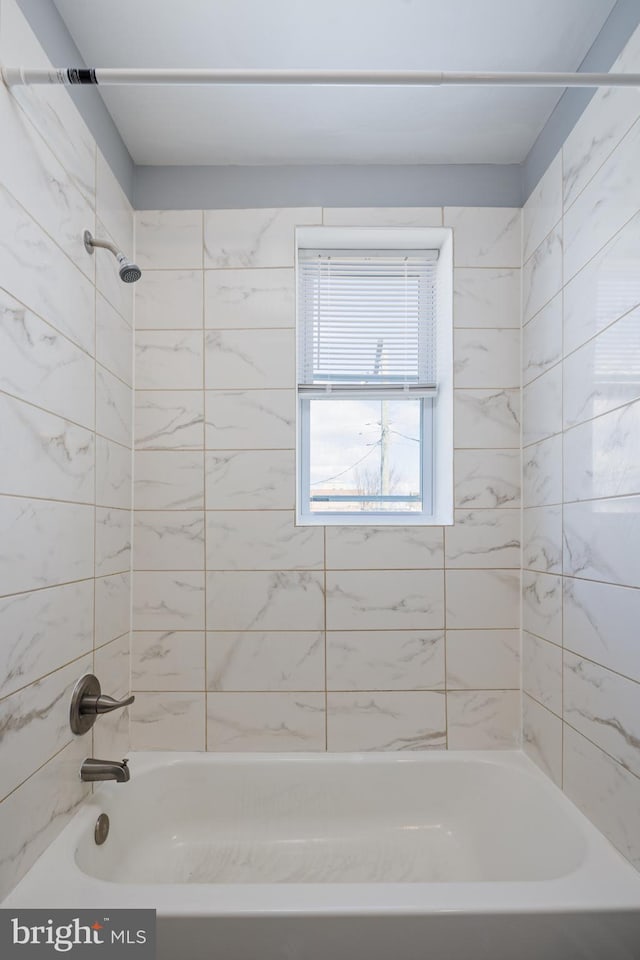 full bath featuring shower / bathing tub combination