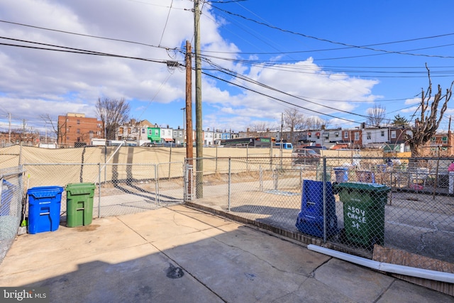 view of patio / terrace with a gate and fence