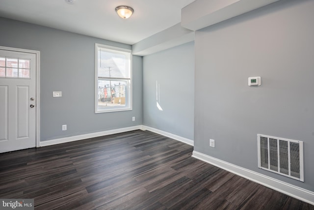 entryway featuring plenty of natural light, visible vents, and baseboards