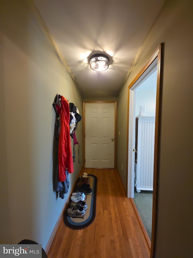 doorway to outside featuring wood finished floors