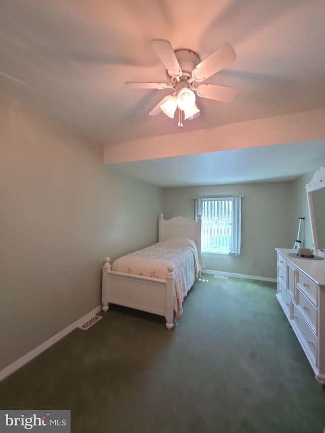 unfurnished bedroom with carpet floors, visible vents, ceiling fan, and baseboards