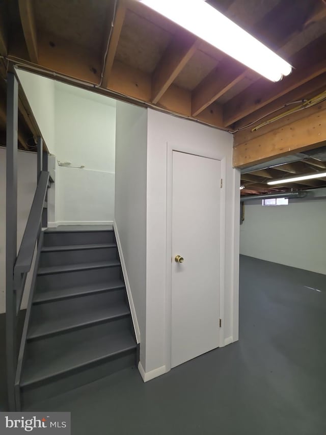 stairs with finished concrete flooring