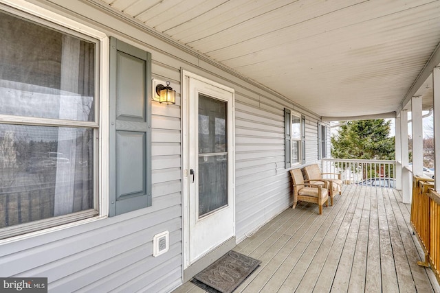 wooden deck with a porch