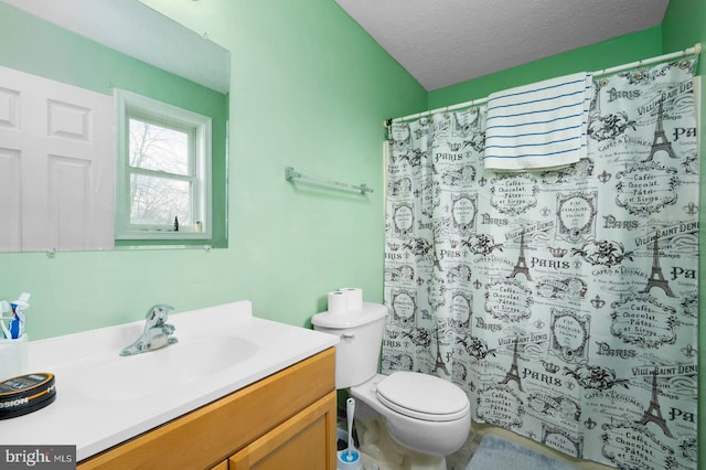 full bathroom featuring a shower with curtain, toilet, a textured ceiling, and vanity