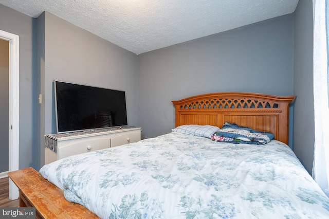 bedroom with a textured ceiling