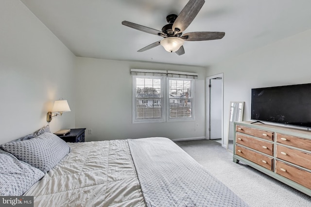 bedroom featuring carpet floors, ceiling fan, and baseboards