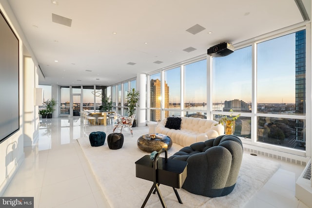 sunroom / solarium with a city view