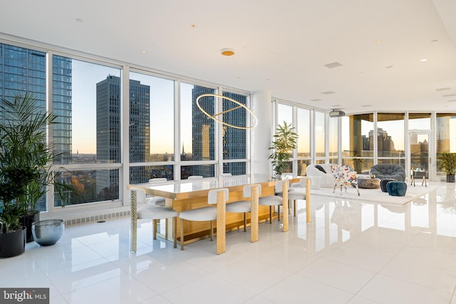 sunroom / solarium featuring a city view