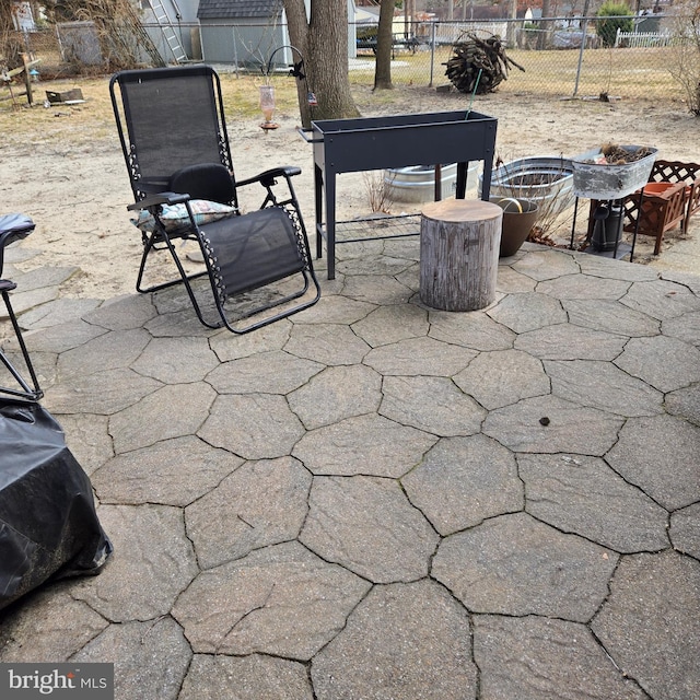 view of patio with fence