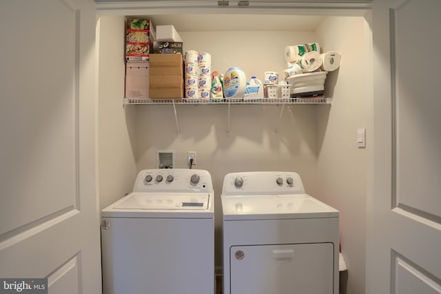 laundry room with laundry area and washing machine and dryer