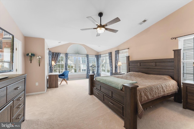 bedroom featuring visible vents, ceiling fan, baseboards, lofted ceiling, and light carpet