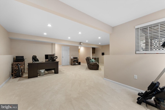 carpeted office space featuring recessed lighting and baseboards