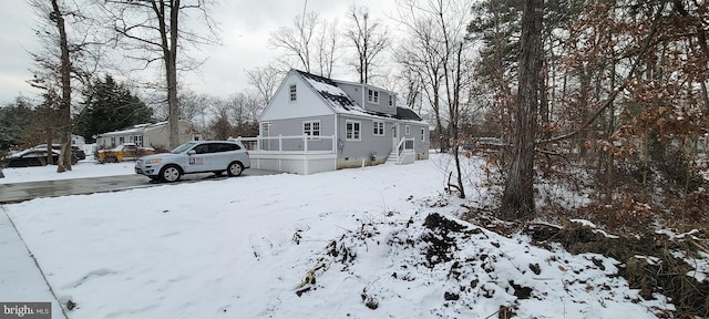 view of snow covered property