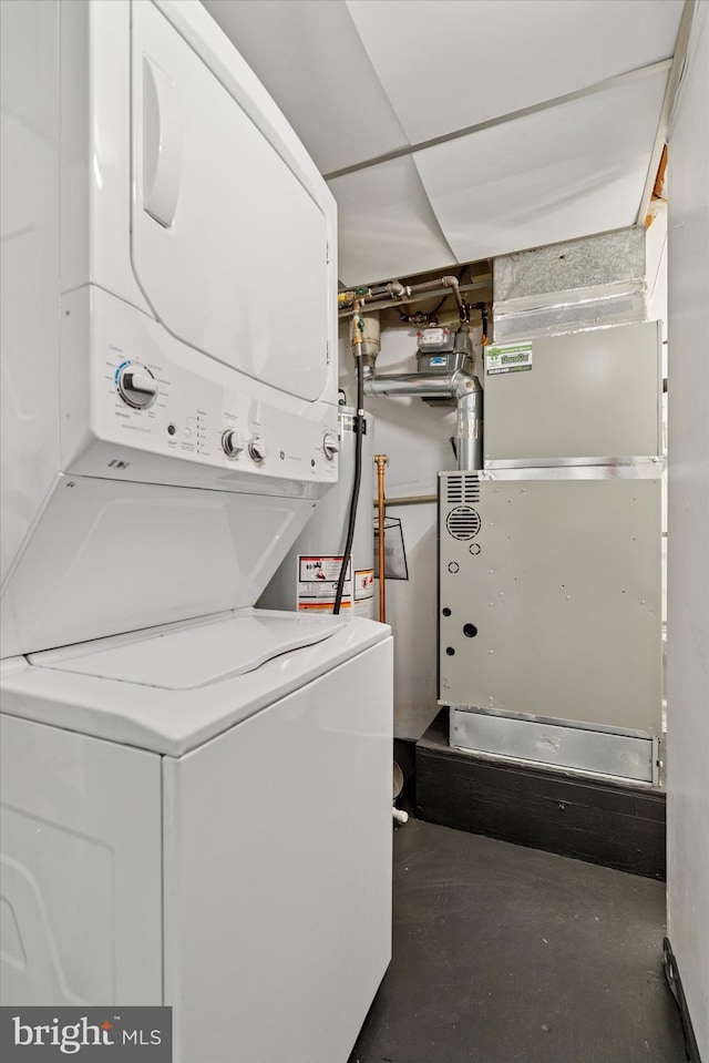 washroom with laundry area and stacked washer and clothes dryer