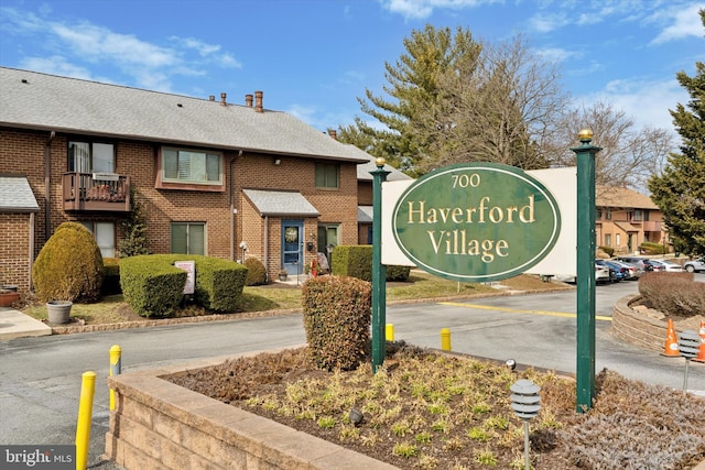 view of community sign