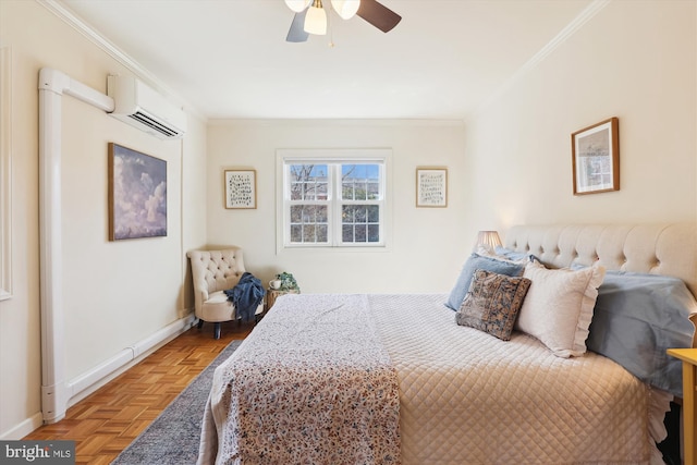 bedroom with a wall unit AC, baseboards, ornamental molding, and a ceiling fan