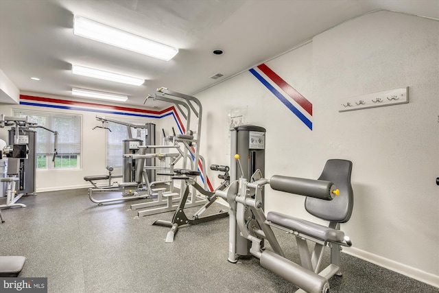 workout area with visible vents and baseboards