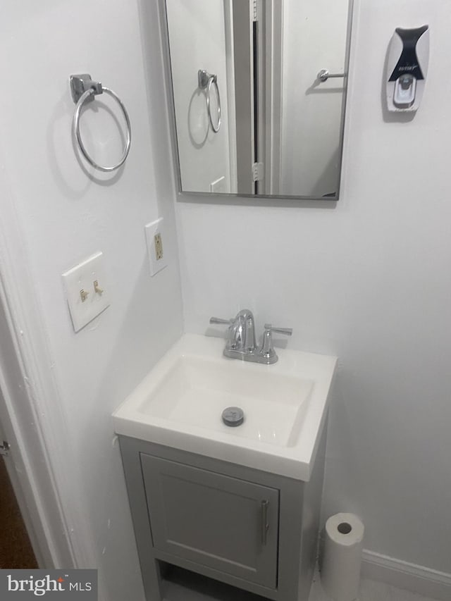 bathroom featuring vanity and baseboards