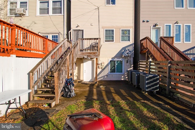 back of house with stairway