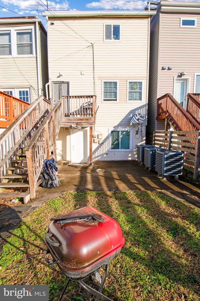 rear view of house with stairway