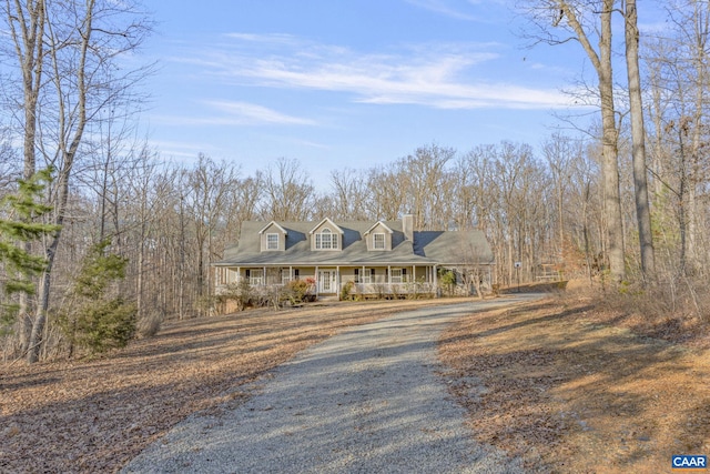 view of front of home with driveway and covered porch