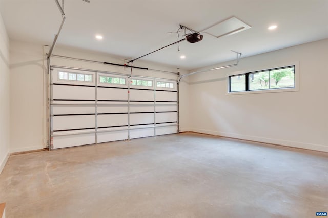 garage with recessed lighting, baseboards, and a garage door opener