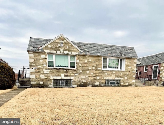 view of front of home featuring stone siding