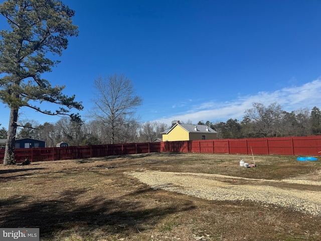 view of yard with fence