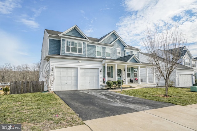 view of front of house featuring aphalt driveway, a porch, a front yard, fence, and a garage