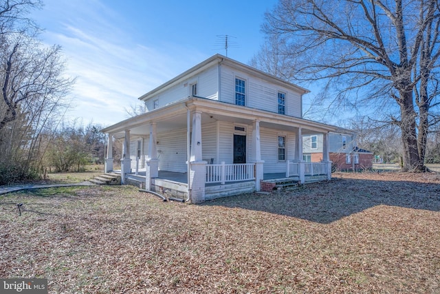 farmhouse-style home featuring covered porch