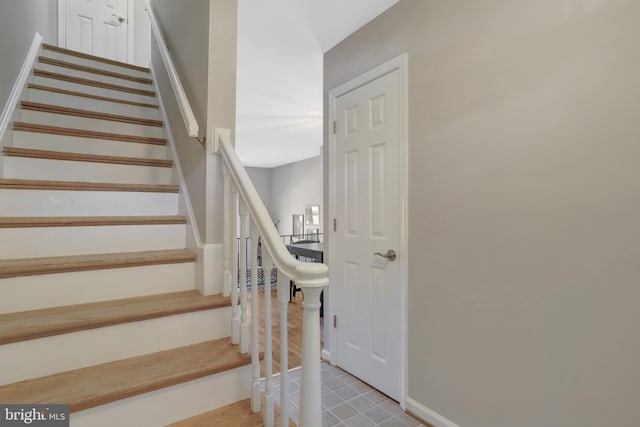 stairway with baseboards