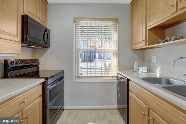 kitchen featuring light brown cabinetry, a sink, black microwave, double oven range, and dishwashing machine