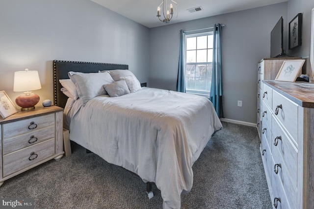 bedroom featuring an inviting chandelier, baseboards, visible vents, and dark colored carpet