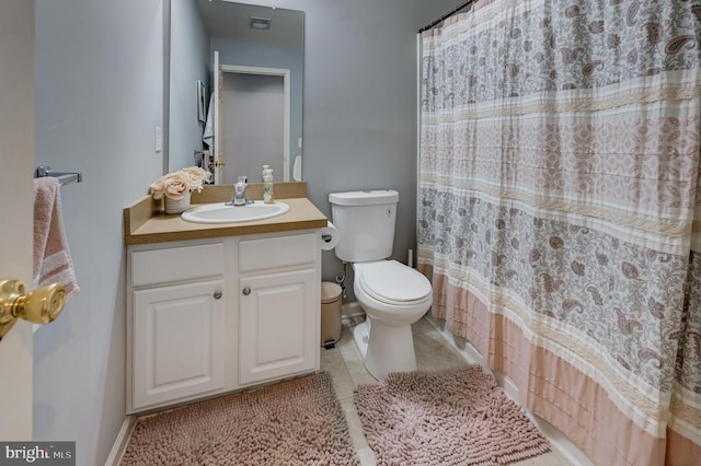 full bathroom with visible vents, toilet, a shower with curtain, tile patterned floors, and vanity