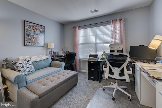 carpeted office space with visible vents