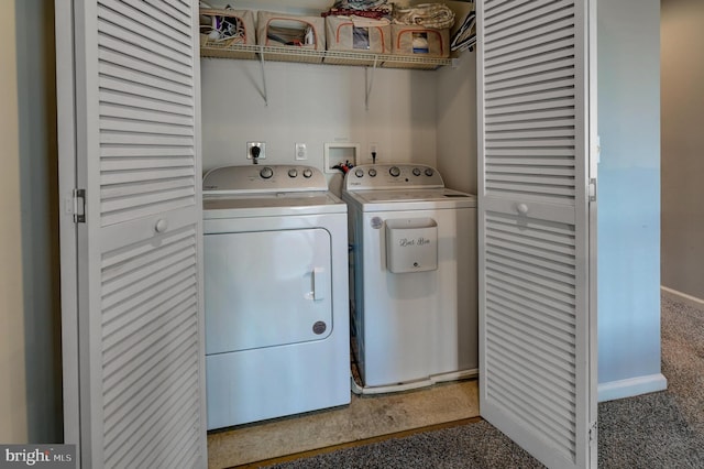 laundry room with laundry area, separate washer and dryer, carpet floors, and baseboards