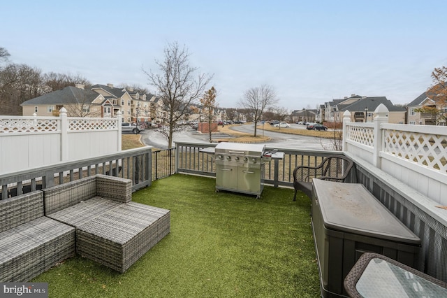 view of yard featuring fence and a residential view