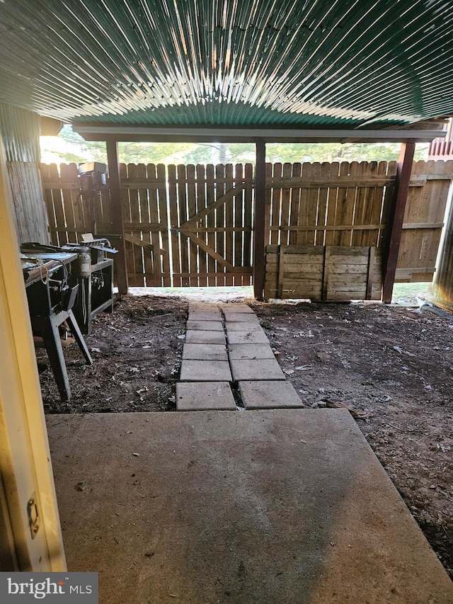 view of patio / terrace featuring fence