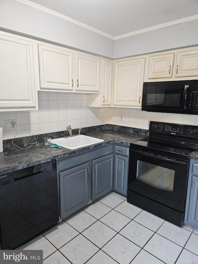 kitchen with dark countertops, a sink, crown molding, black appliances, and backsplash